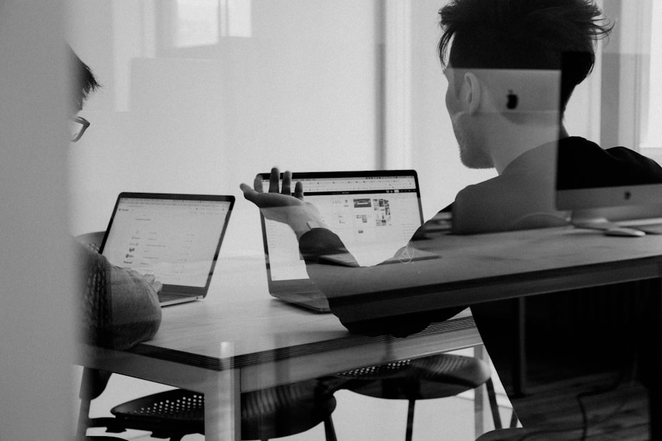Data analytics professional reviewing business dashboards and reports