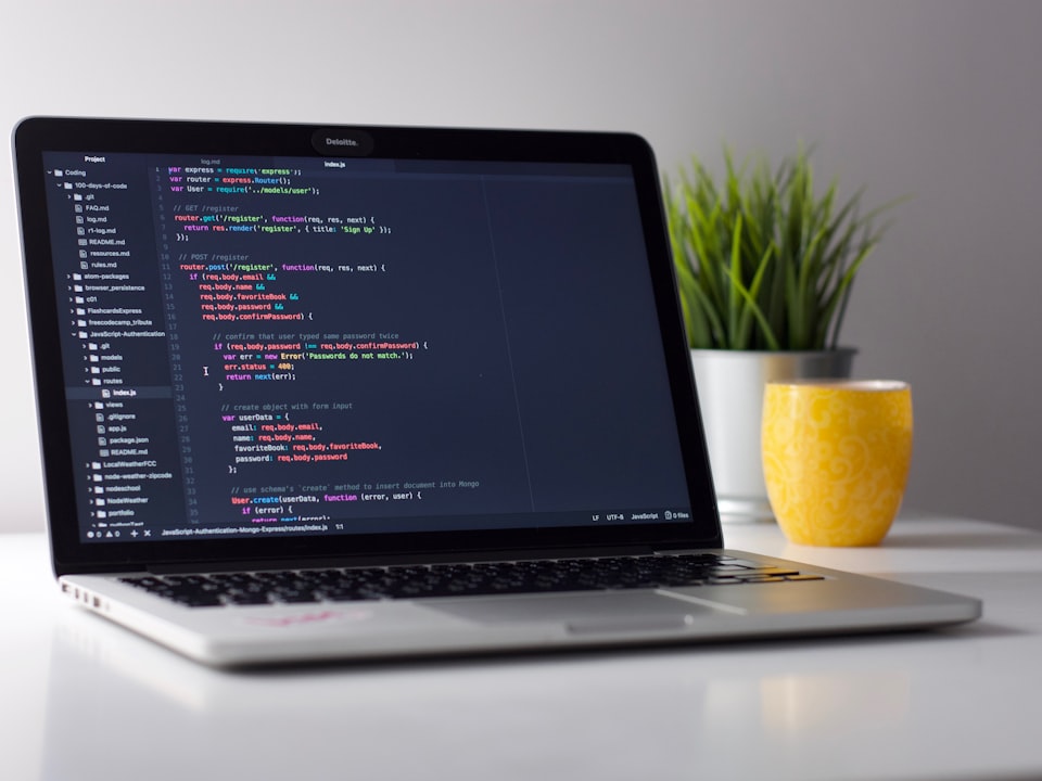 Developer practicing technical interview coding on a laptop during a live mock session